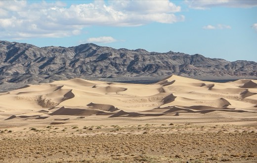 Sand dunes of Khongoryn Els below the Gobi Gurvansaikhan mountains