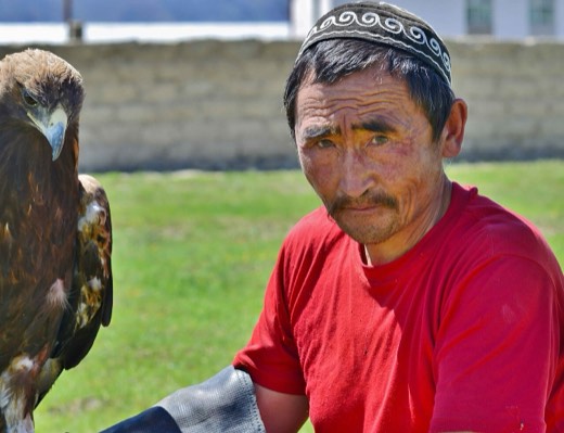 Kazakh eagle hunter with a golden eagle in Bayan-Ölgii